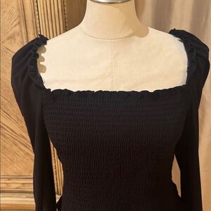 BarIII Black stretchy top with details on cuffs.